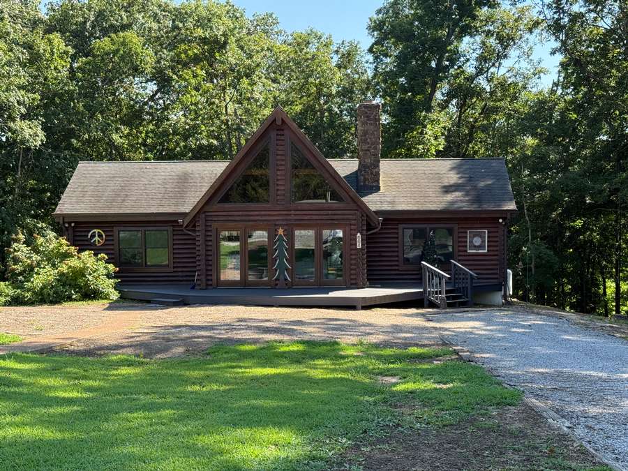 Log Cabin Home on 40 Acres