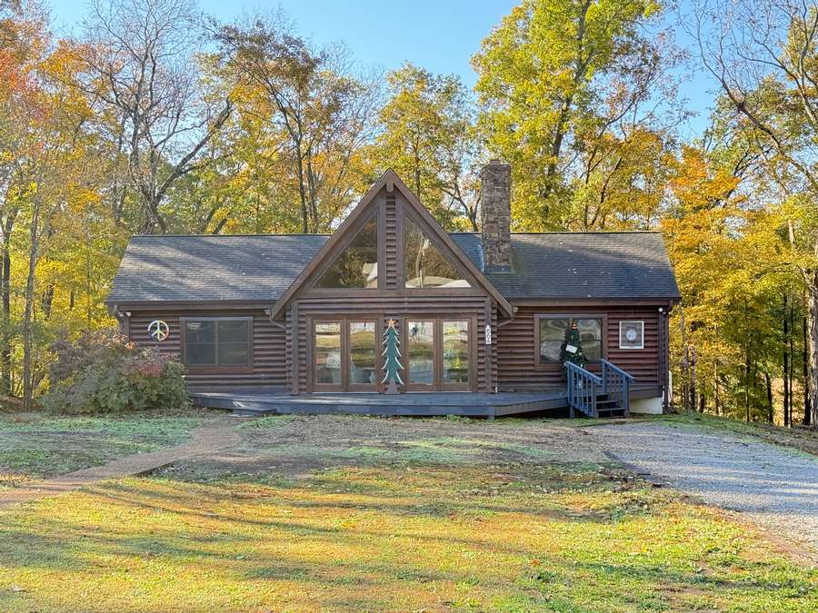 Log Cabin Home on 40 Acres