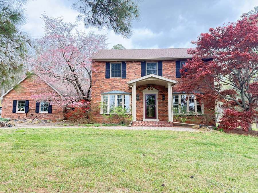 Stunning Brick Home, Workshop and Pond
